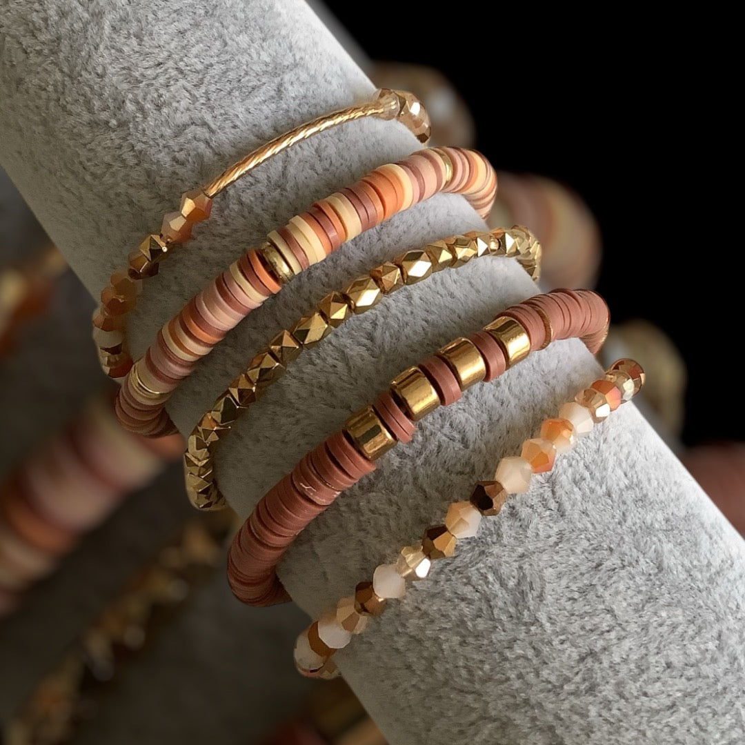 Handmade boho bracelet stack with terracotta, gold, and neutral tone beads – Desert Dusk by Pxl Nate
